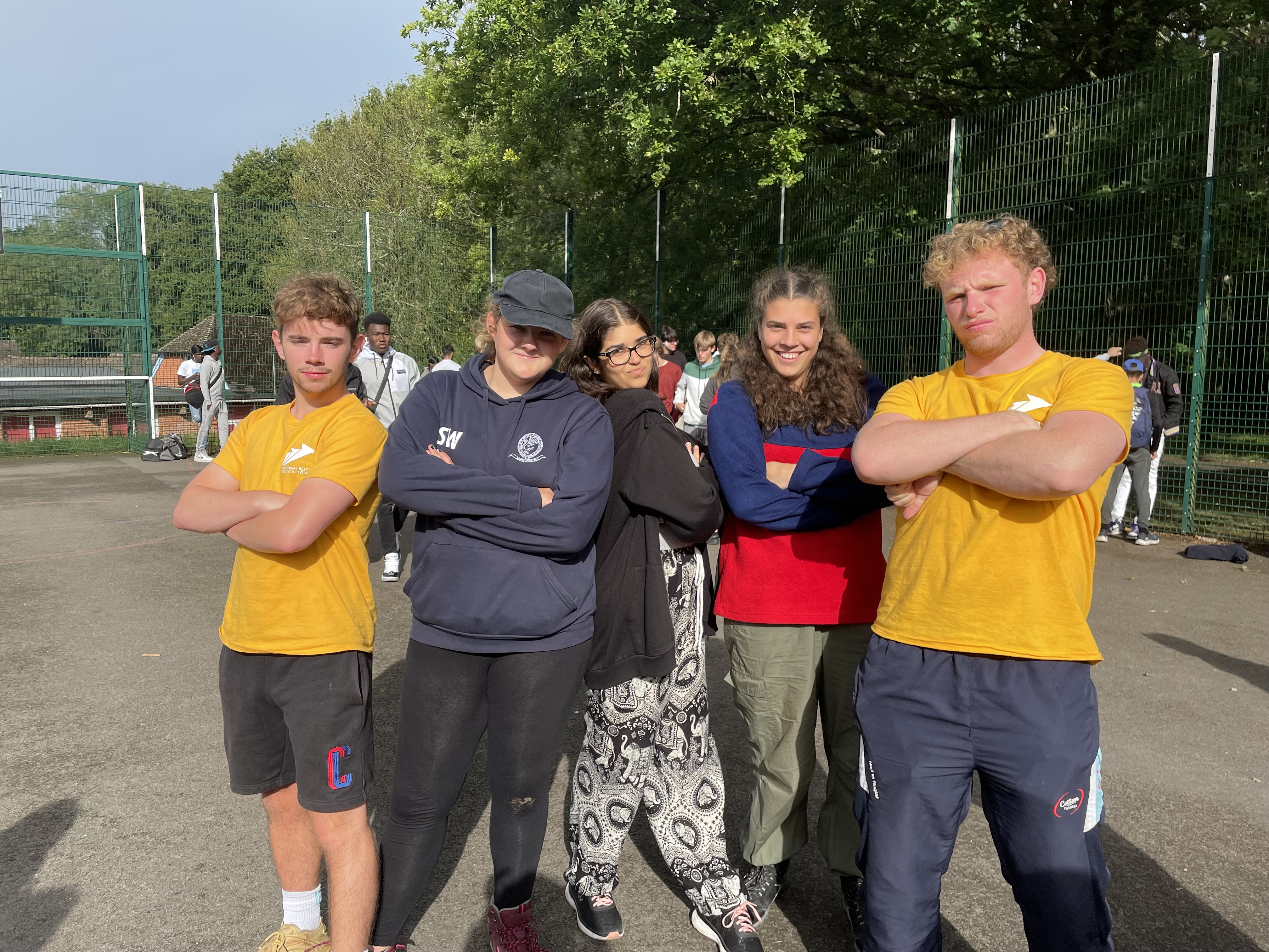 Boys and girls on NCS experience posing for a picture together 