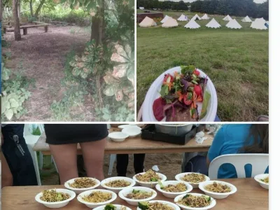 A picture of an outdoor camping scenes. Top left: A wooded area with a bench. Top right: A field with several bell tents and a plate of colourful salad in the foreground. Bottom: A wooden table with numerous plates of noodle and vegetarian meat meals. 