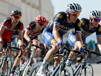 A group of cyclists on their bikes in a race