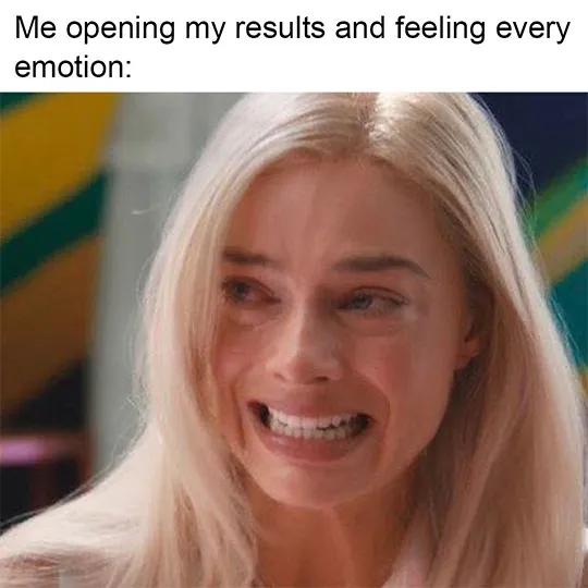 A meme of the character Barbie, played by Margot Robbie, looking upset. Her eyes are watery, and her mouth is grimacing with pain. 