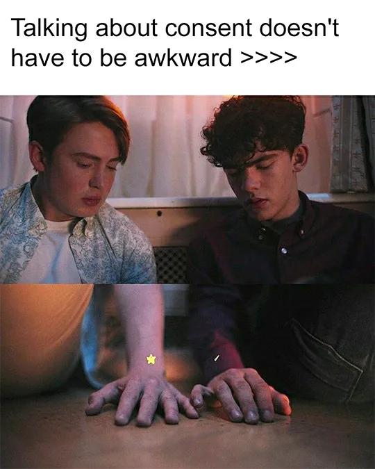 Two male characters from TV series Heartstopper are sat down and are leaning in towards each other. They're both looking at their hand on the floor, which have grown closer together and their little fingers are just touching. The text reads: Talking about consent doesn't have to be awkward.